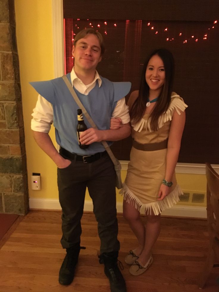 a man and woman dressed up in costumes