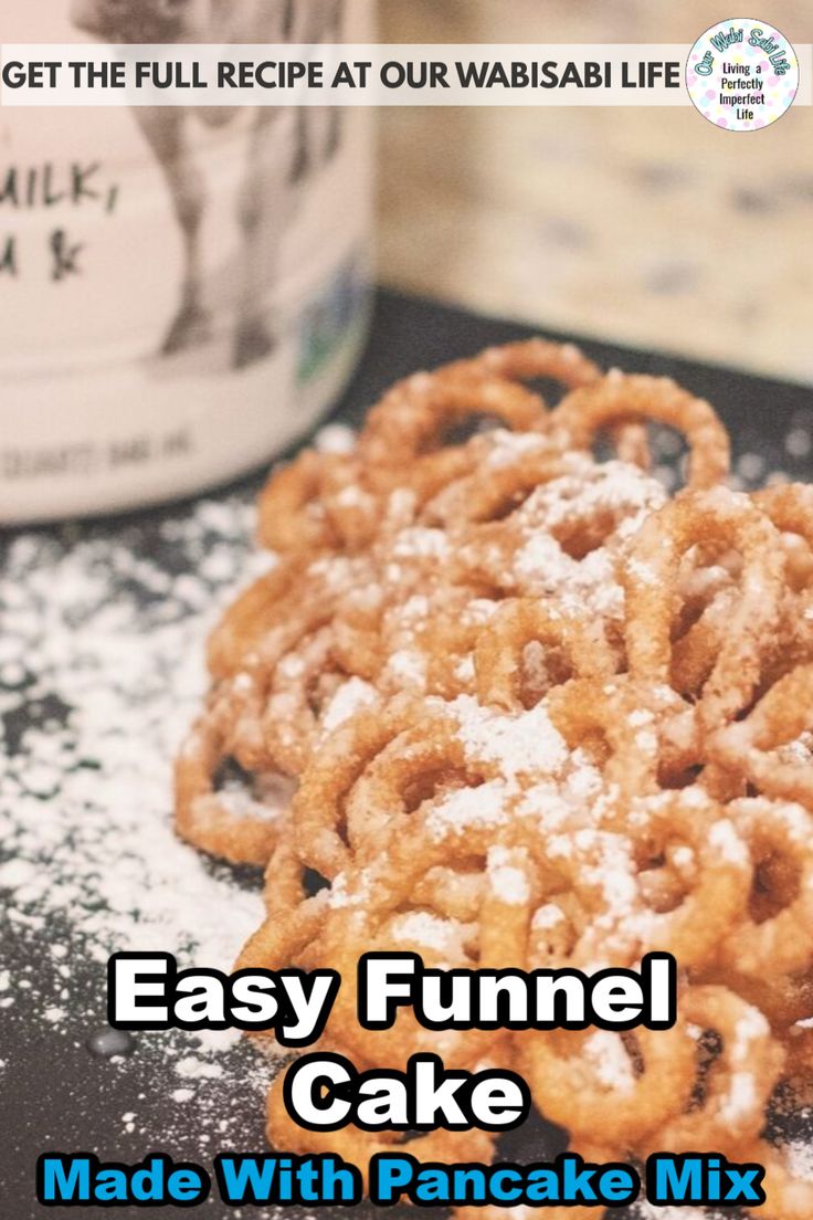 an easy funnel cake made with pancake mix and powdered sugar is ready to be eaten