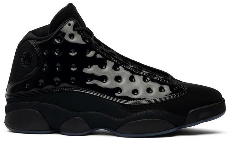 The ‘Cap and Gown’ colorway of the Air Jordan 13 renders the retro basketball sneaker with a Triple Black palette similar to the ‘Black Cat’ model. Featuring a patent leather and nubuck formation on the upper . the outsole maintains the panther’s-paw-inspired design. The shoe disguises the signature hologram icon next to the collar with [...] Retro Cap, Black Palette, Cat City, Retro Basketball, Womens Basketball Shoes, Air Jordan 13 Retro, Jordan 13 Retro, Cap And Gown, Jordan 13