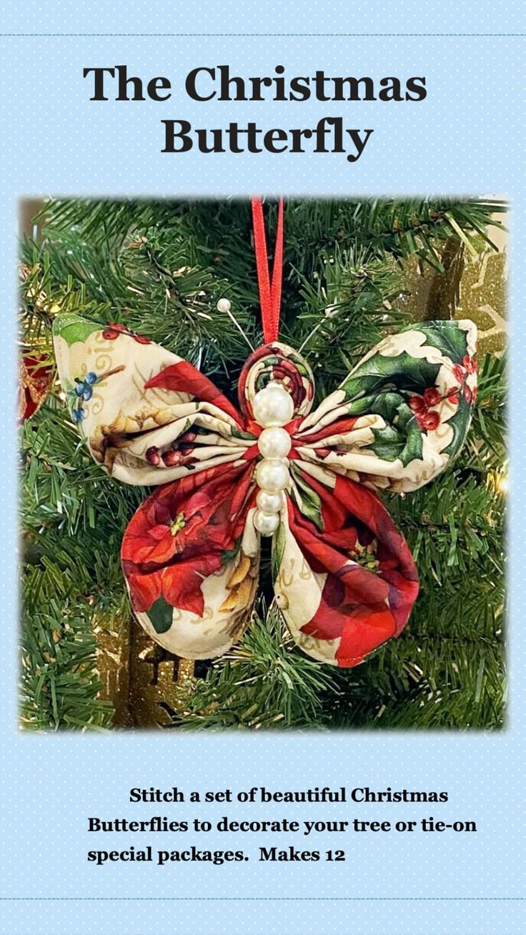 the christmas butterfly ornament is hanging on a tree