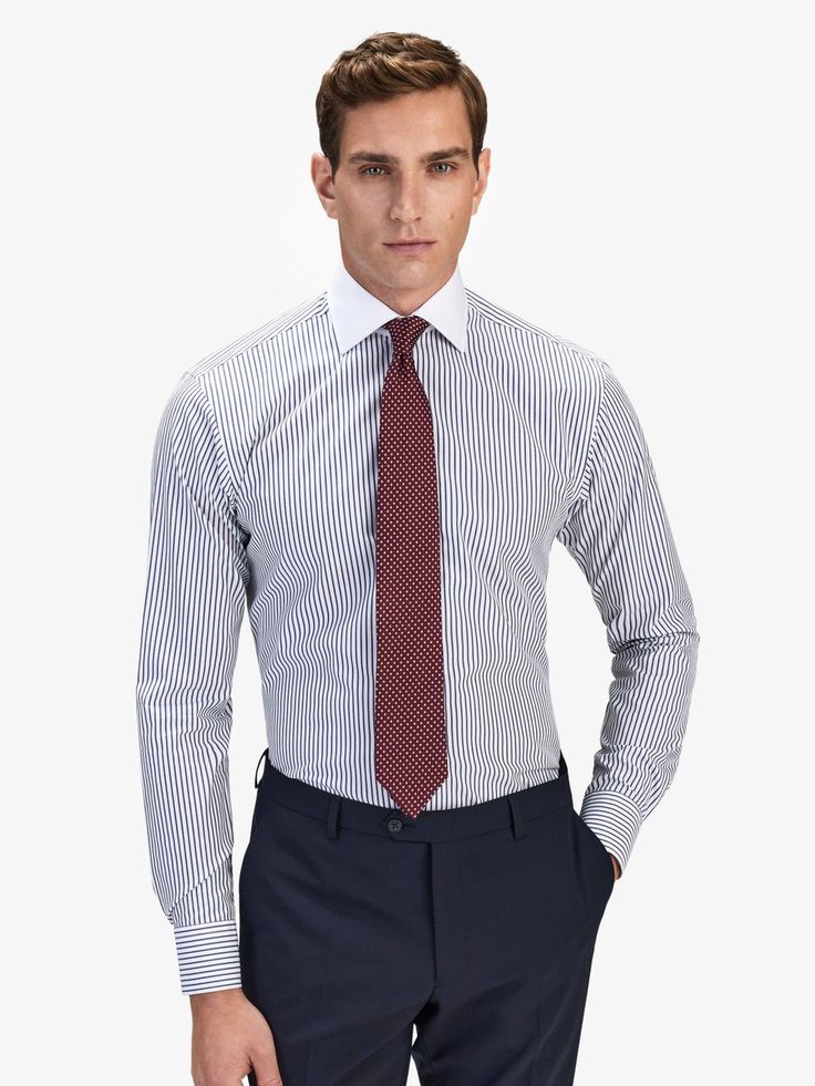 Men’s striped shirts - Dark blue striped poplin shirt with classic collar.
Add a little extra detail to your looks with a striped shirt and pair it with your favorite workwear outfit. Whatever your style, add some interest with a striped men's shirt. 

Striped shirts are timeless for both formal and casual occasions. Go ahead and add an eye-catching edge to formal and casual ensembles with our striped shirts.
Material:100% Cotton. Striped Shirts, Blue Striped Shirt, Poplin Shirt, Go Ahead, Striped Shirt, Dress Shirt, Bow Tie, Work Wear, Dark Blue