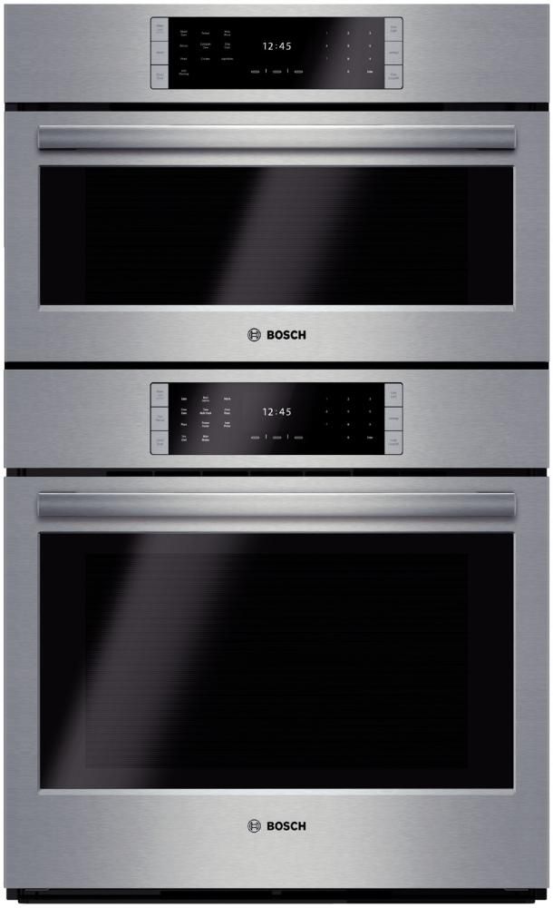 two stainless steel ovens side by side