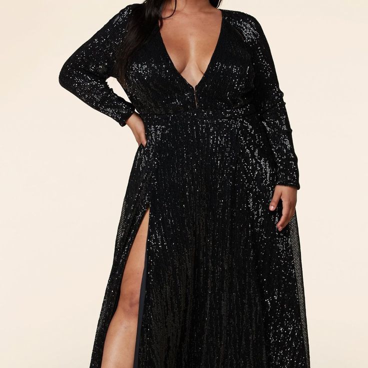 Black Long Sequined Gown Wuth High Leg Split Black Gown For Night Out Party Season, Black Gown For Party Season And Night Out, Black Maxi Dress For Holiday Night Out, Black Floor-length Holiday Dress, Black Holiday Maxi Dress For Night Out, Holiday Black Maxi Dress For Night Out, Black Long Sleeve Gown For Prom Season, Black Long Sleeve Gown For Prom, Sequined Long Sleeve Gown For Night Out