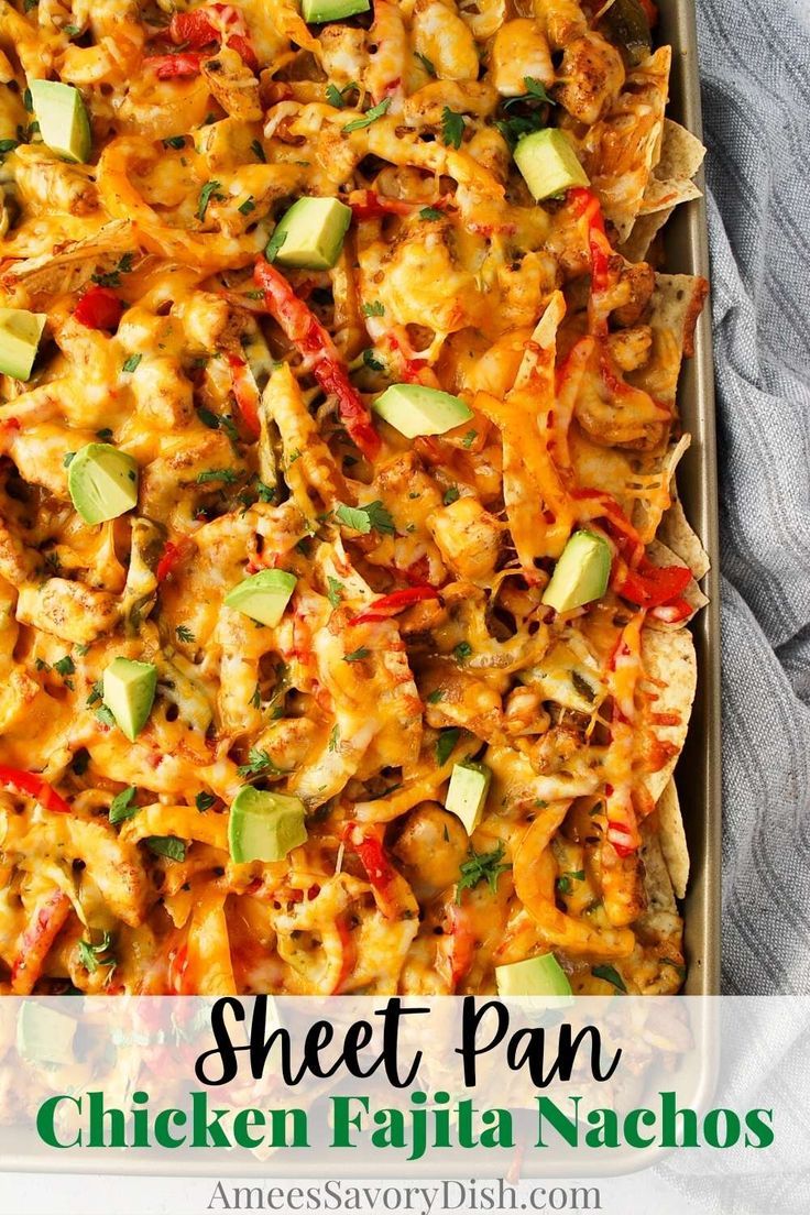 a sheet pan filled with chicken fajita nachos