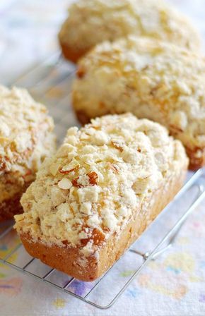 three muffins sitting on top of a cooling rack