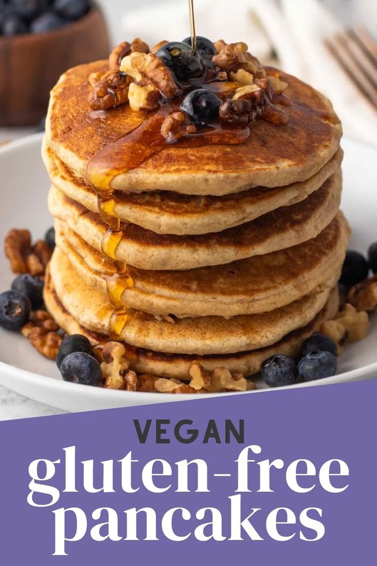 stack of vegan gluten - free pancakes with blueberries and walnuts