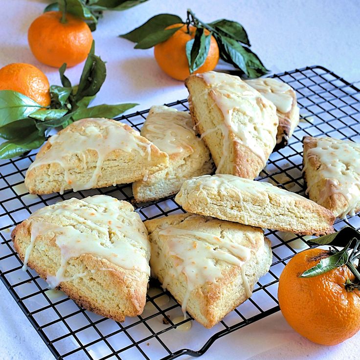 orange scones and tangerines on a cooling rack