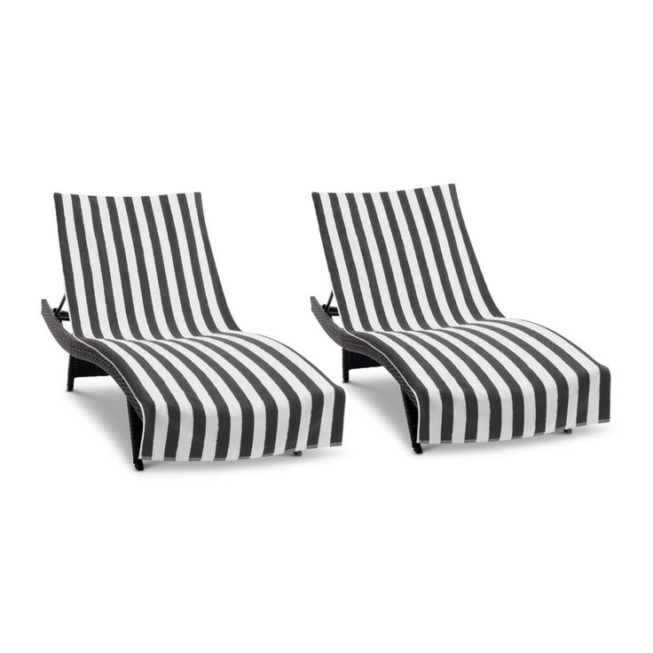 two black and white striped chairs sitting next to each other on top of a white floor