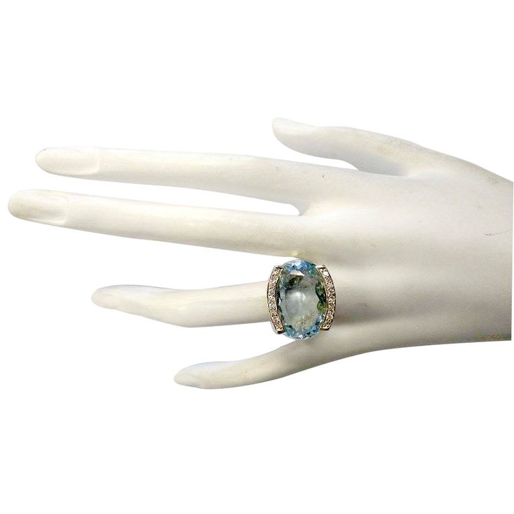 Stamped: 14K Yellow GoldTotal Ring Weight: 12.5 GramsRing Length: N/ARing Width: N/AGemstone Weight: Total Natural Aquamarine Weight is 25.00 Carat (Measures: 12.30x19.90 mm)Color: BlueDiamond Weight: Total Natural Diamond Weight is 0.35 CaratColor: F-G, Clarity: VS2-SI1Face Measures: 17.00x19.90 mmSku: [702906W] Elegant Oval Multi-stone Topaz Ring, Luxury Multi-stone Crystal Ring For Anniversary, Oval Topaz Ring With Center Stone For Formal Occasions, Formal Multi-stone Topaz Ring With Round Cut, Formal Multi-stone Topaz Ring In White Gold, Formal White Gold Multi-stone Topaz Ring, Oval Wedding Gemstones With Diamond Accents, Elegant Multi-stone Halo Ring For Formal Occasions, Formal Multi-stone 14k Gold Rings