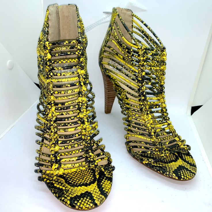 Gianni Bini Snake Print Strappy Bootie Nwt Bold Yellow Heels For Party, Yellow High Heel Spring Shoes, Yellow High Heel Shoes For Spring, Yellow Bold Ankle Strap Heels, Yellow Round Toe Heels For Spring, Casual Neon Yellow Open Toe Heels, Trendy Yellow Heels For Spring, Yellow Synthetic Heels For Spring, Bold Yellow Open Toe Heels