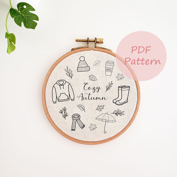 a hand embroidery pattern with the words cozy autumn on it