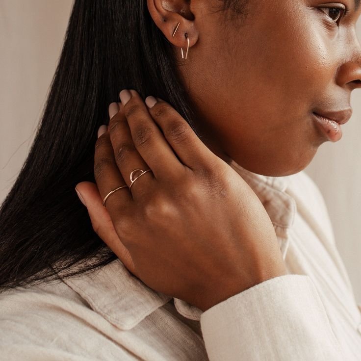 The Jude Ring is dainty and plain like our Jane ring, but a little thicker. A simple, minimalist band, the Jude Ring is designed to be worn as a timeless layering piece. Dainty 14k Gold Midi Rings For Everyday, Simple Stackable Initial Ring For Everyday, Dainty Round Band Rings For Everyday, Minimalist Yellow Gold Stackable Rings For Promise, Dainty Initial Ring With Round Band For Everyday, Minimalist Yellow Gold Stackable Promise Rings, Delicate Open Ring For Everyday Wear, Dainty Open Ring For Everyday Wear, Dainty Everyday Initial Ring With Round Band