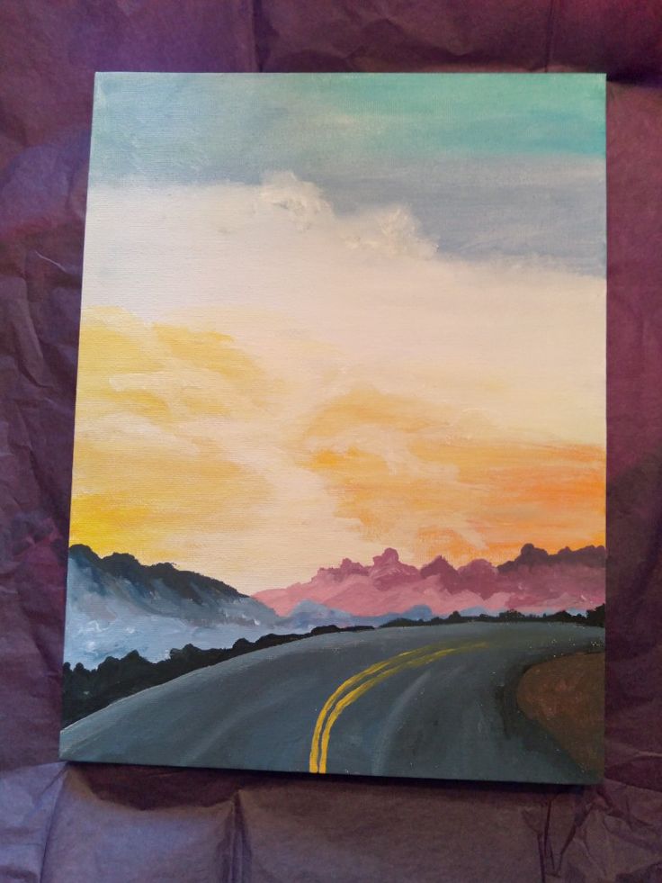 an acrylic painting of a road with mountains and clouds in the background at sunset