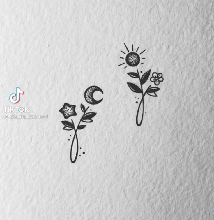 three flowers with the letter c on them are drawn in black ink, and each flower has