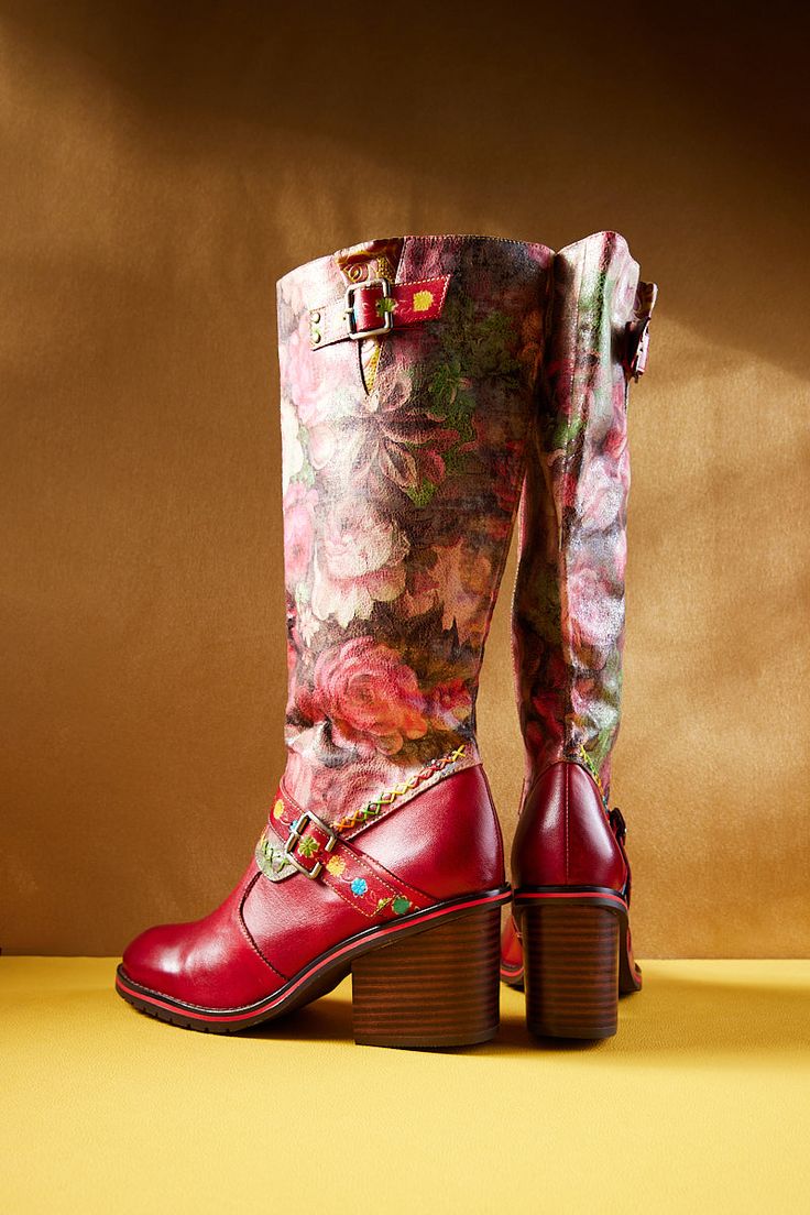 Step into elegance with our Soffia knee high boots. Crafted with luxurious wide calf leather, these Maude floral boots are the perfect blend of style and comfort. Featuring a unique floral design, they will elevate any outfit and make you stand out from the crowd. 2.75'' heel 14.7'' shaft 17.6'' circumference Side zip closure Leather upper Cotton & Leather lining Leather insole Rubber sole Luxury Wide Calf Heeled Boots, Elegant Red Leather Knee-high Boots, Chic Red Leather Knee-high Boots, Red Leather Knee-high Boots For Fall, Red Knee-high Boots For Spring, Spring Red Knee-high Heeled Boots, Red Knee-high Heeled Boots For Spring, Luxury Red Heeled Boots For Fall, Unique Floral Design