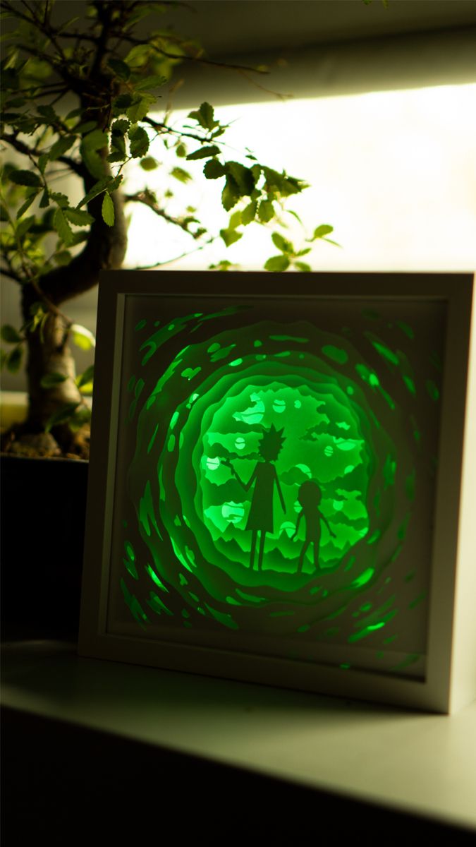 an image of a person standing in the middle of a green tunnel with leaves on it