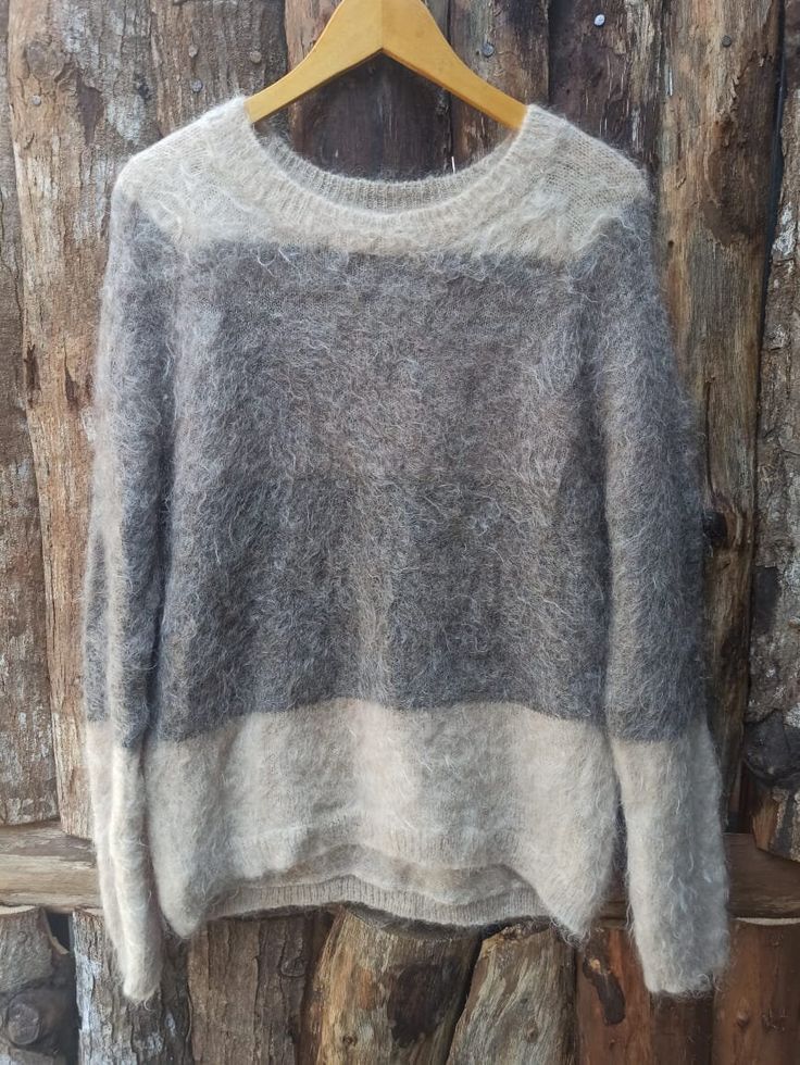 Wool Sweaters Mainson Olga Measurement : Chest : 22"inch Length : 25" inch Please ensure the details of the sweaters such as flaws, holes, stains, and others thoroughly or if you need more details don't hesitate to message us for more information. *PLEASE SEE ALL PHOTO an *OPEN TO OFFER *NEGOTIABLE ON 🌏 Shipping worldwide with delivery time estimated up to 3-30 working days. *AFTER YOU BUY LEAVE YOUR PHONE NUMBER FOR SHIPPING📲 Be careful before buying !! Be a smart buyer It's better to regret One Size Gray Sweater For Layering, Cozy Fit Crew Neck Knit Sweater, One Size Soft Knit Crew Neck Sweater, One Size Knit Crew Neck Sweater, One Size Crew Neck Knit Sweater, Gray Knit Sweater With Crew Neck, Gray Crew Neck Sweater With Knit Fabrication, Oversized Vintage Wool Sweater, Wool Sweaters