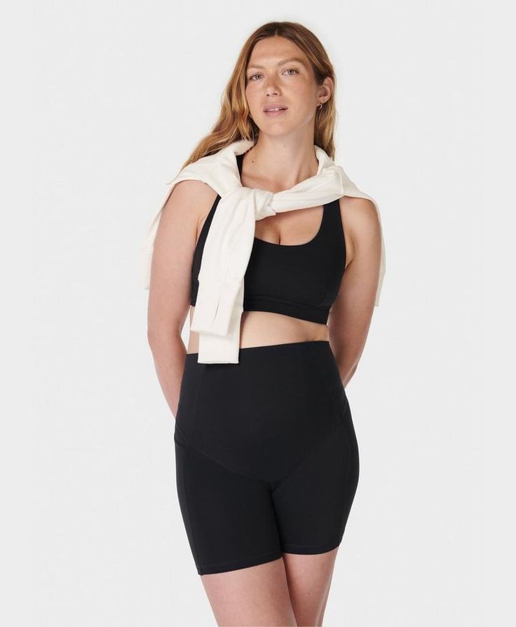 Our versatile new workout shorts designed to keep you moving through pregnancy. Made from breathable All Day fabric that feels buttery soft against your skin. Stretchy high waist with a comfortable over-the-bump fit. Side slip pocket for your phone. Inseam length 15cm / 6". Model is in her first trimester, wearing size S. Height: 178cm /5'10". Style Code: SB9960RColour: Black Supportive Activewear With Built-in Shorts For Workout, Workout Activewear With Built-in Bra, Short Length, Workout Shapewear Activewear With Built-in Bra, Compressive Shapewear Activewear For Summer, Compressive Summer Shapewear Activewear, Summer Compressive Shapewear Activewear, Workout Shapewear Biker Shorts With Built-in Shorts, Shapewear Biker Shorts For Workout, Comfortable Activewear With Built-in Shorts For Workout