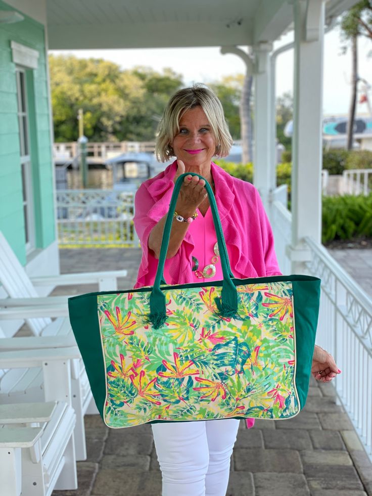 Bold summer preppy vacation prints Measures 19-1/2"W x 13-3/4"H x 6-1/4"D. outside 100% Cotton Inside 100 polyester lining Printed Canvas. Imported. Spring Green Canvas Bag, Green Tropical Beach Bag For Everyday Use, Tropical Green Beach Bag For Everyday Use, Green Large Capacity Canvas Beach Bag, Green Canvas Beach Bag For Travel, Large Green Canvas Beach Bag, Spring Travel Canvas Beach Bag, Large Capacity Green Canvas Beach Bag, Casual Beach Bag For Weekend In Spring