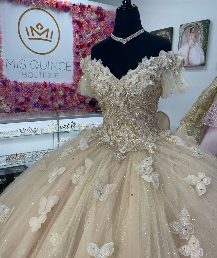 Light Gold Quinceanera Dresses, Quinceanera Dress Champagne, Butterfly Quince Dresses, Tan Quinceanera Dresses, Quince Dress Butterfly, Champagne Dresses Quinceanera, Champagne 15 Dresses Quinceanera, Quince Dresses Beige, Golden Quince Dress