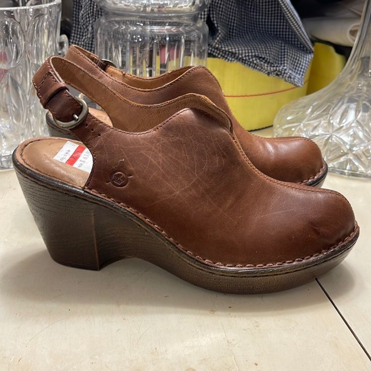 Brand New Born Clogs In Size 9 Comfortable Clogs With Leather Footbed And Wedge Heel, Comfortable Clogs With Stacked Heel And Round Toe, Casual Wedge Heel Mules With Heel Loop, Casual Mules With Wedge Heel And Heel Loop, Casual Mules With Heel Loop And Wedge Heel, Brown Casual Wedge Heel Clogs, Casual Slingback Clogs With Stacked Heel, Casual Slingback Clogs With Wooden Heel, Casual Clogs With Stacked Open Heel