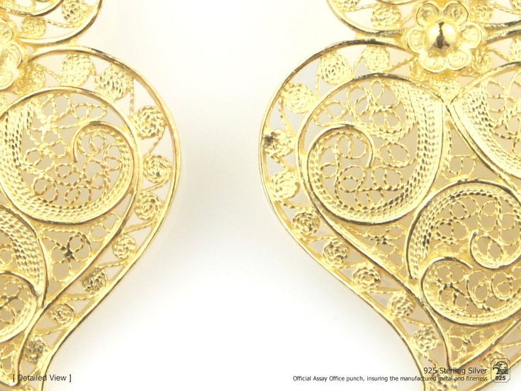 "Original Portuguese Filigree Viana Heart Earrings, Fashion Folk - Traditional Filigree Jewelry from Viana, Portugal - Brand-new (Unused). Very elegant and exclusive earrings, handmade by experienced Artisans and manufactured in 925 Sterling Silver with 24k Gold Bath. Item specifics: Model: Viana Heart EARRINGS Reference: JM-BR706 Backing type: hook Material: 925 Sterling Silver Height: aprox. 5.5 cm (with hook) Weight: aprox. 10 grams Finishing: 24k Gold Bath Condition: Brand-new (Unused) Origi Traditional Heart-shaped Jewelry For Weddings, Traditional Heart Jewelry For Wedding, Traditional Heart-shaped Wedding Jewelry, Traditional Heart-shaped Yellow Gold Jewelry, Traditional Heart-shaped Jewelry For Festive Occasions, Traditional Jewelry For Valentine's Day Celebration, Traditional Gold Heart-shaped Jewelry, Traditional Gold Heart Jewelry, Traditional Yellow Gold Jewelry For Valentine's Day