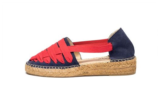 Classic Dali Blue Casual Sandals With Red Sole For Spring, Casual Sandals With Red Sole And Flat Heel, Casual Sandals With Flat Heel And Red Sole, Red Flat Espadrilles With Woven Sole, Casual Red Sandals With Woven Sole, Red Slip-on Espadrilles With Woven Sole, Red Slip-on Espadrilles With Rubber Sole, Red Espadrilles With Rubber Sole For Spring, Blue Leather Espadrilles With Rubber Sole