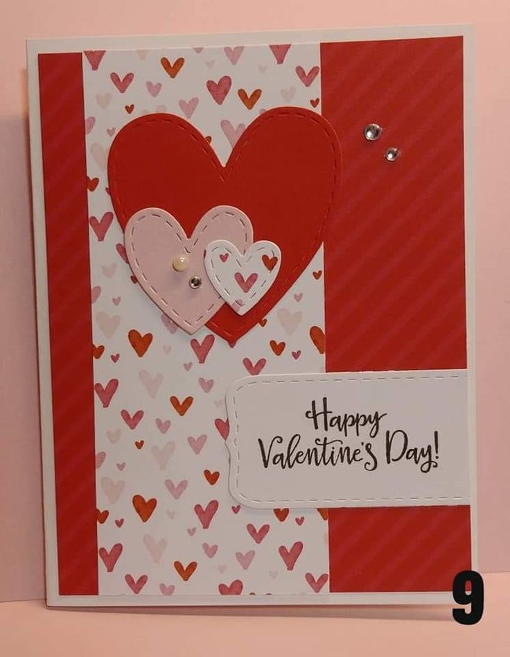 a valentine's day card with two hearts on it