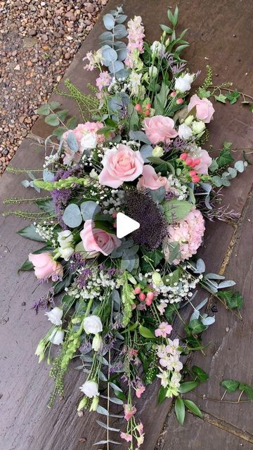 a bouquet of flowers is laying on the ground