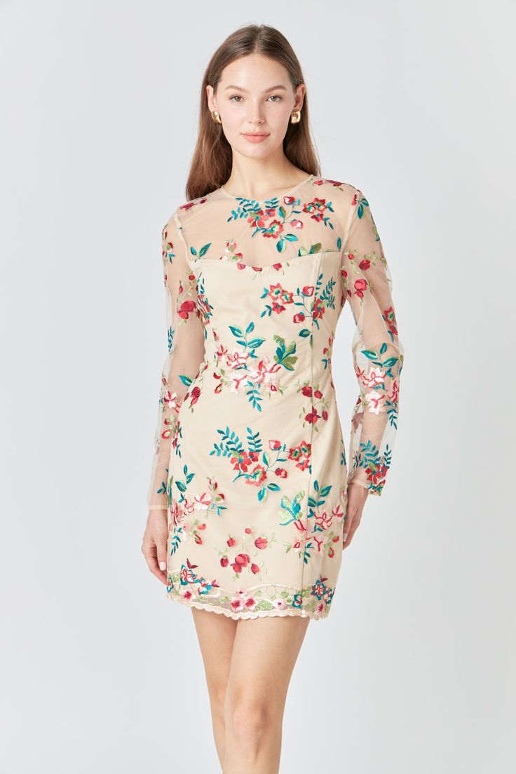 This stylish mini dress features an eye-catching floral embroidery a flattering fitted silhouette and long sleeves for a sophisticated feminine look. Perfect for special occasions and elegant evenings out. Floral embroidery Mini length Fitted Long sleeves Round neckline Pom Pom trims Back zipper Lining Hand wash cold Do not bleach Do not tumble dry Iron low Shell: 100% Polyester Contrast: 100% Nylon Lining: 95% Polyester 5% Spandex Exclusive of Decoration HN1773D Total length: 34.5 " Bust: 34" X Floral Print Mini Dress For Wedding, Spring Evening Embellished Embroidered Dress, Embellished Spring Evening Embroidered Dress, Chic Floral Embroidered Evening Dress, Chic Embroidered Dress With Floral Design For Evening, Spring Evening Embroidered Dresses, Chic Formal Dress With Floral Embroidery, Spring Floral Print Embroidered Fitted Dress, Chic Embellished Embroidered Spring Dress