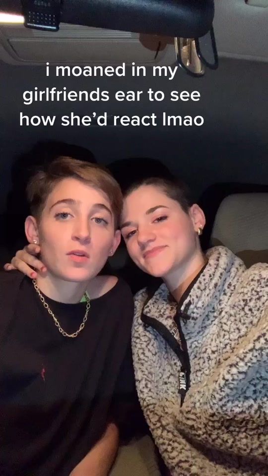 two people sitting next to each other on a couch with the caption i moved in my girlfriend's ear to see how she'd react imo