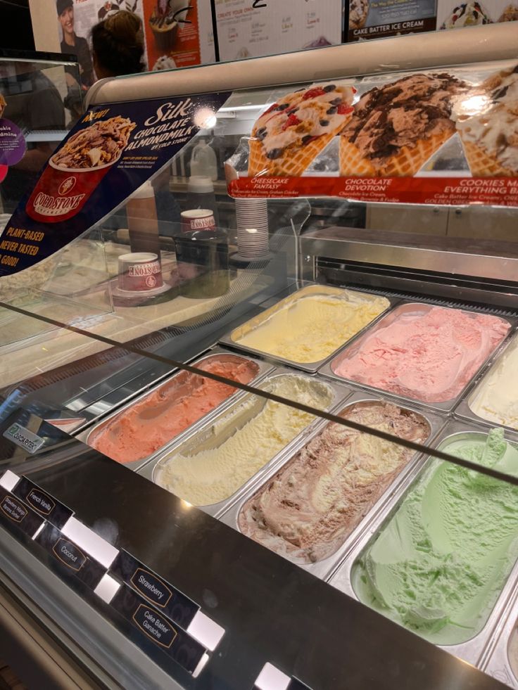 a display case filled with different types of ice cream