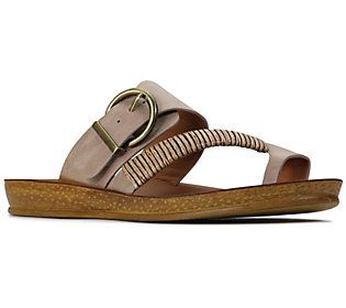 Step up your sunny-day aesthetic with this comfy sandal boasting a flexible sole and a chic bamboo-wrapped strap for stylish pedicure appeal. From Los Cabos. Casual Toe Ring Sandals With Buckle For Vacation, Summer Beach T-strap Sandals With Leather Footbed, Comfortable T-strap Sandals With Leather Footbed For Beach, Casual Summer Footbed Sandals With Toe Loop, Leather Footbed Toe Loop Flip Flops For Beach, Toe Loop Flip Flops With Leather Footbed For Beach, Summer Toe Post Sandals With Buckle Closure, Casual Toe Loop Footbed Sandals For Summer, Beach T-strap Sandals With Buckle Closure