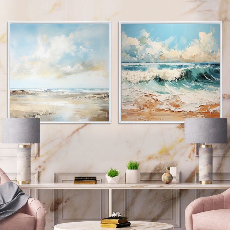 two paintings are hanging on the wall above a coffee table and chairs in a living room