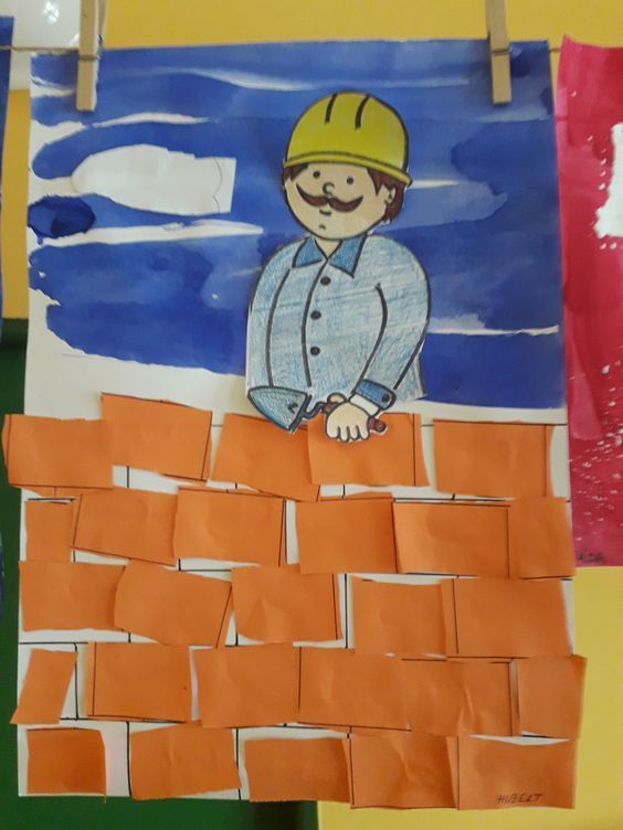 a child's art project with construction theme