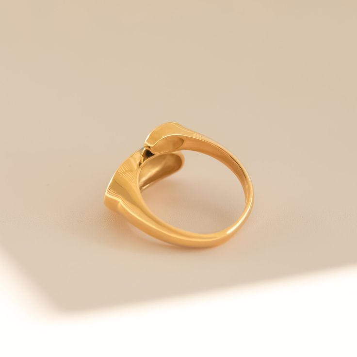 DESCRIPTION & DETAILS This gold ring is stylish, beautiful, and chic. The split design makes this solid style ring can complete any outfit. You can wear it alone or stack it with other rings to show your charm, and you can style a variety of outfits suitable for all occasions. Plating: 14k Gold Materials: 14k Gold on Stainless Steel Measurements: 45+5cm，2*1.3cm Hypoallergenic SUSTAINABILITY In-house plating - All pieces are handcrafted by our in-house jewelers ensuring a high standard of working Everyday Gold Plated Open Signet Ring, Gold Open Ring With Initial For Everyday Wear, Gold Initial Open Ring For Everyday, Elegant Adjustable Initial Ring With Polished Finish, Timeless Gold Initial Ring For Everyday, Timeless Gold Initial Ring For Promise, Timeless Gold Initial Promise Ring, Elegant Everyday Initial Ring With Simple Design, Classic Open Heart Ring