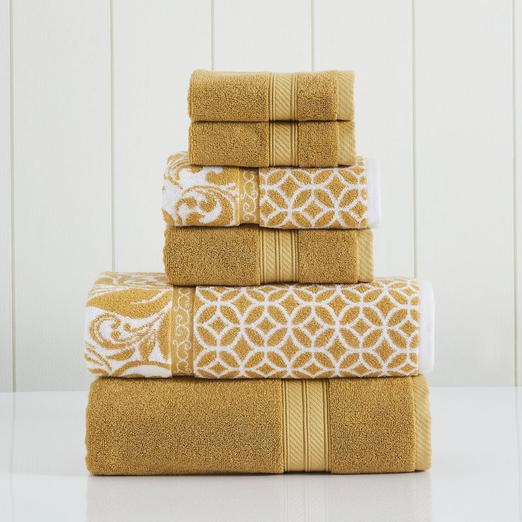 four towels stacked on top of each other