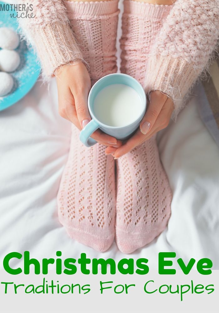 a woman in pink sweater holding a cup of coffee with the words christmas eve traditions for couples