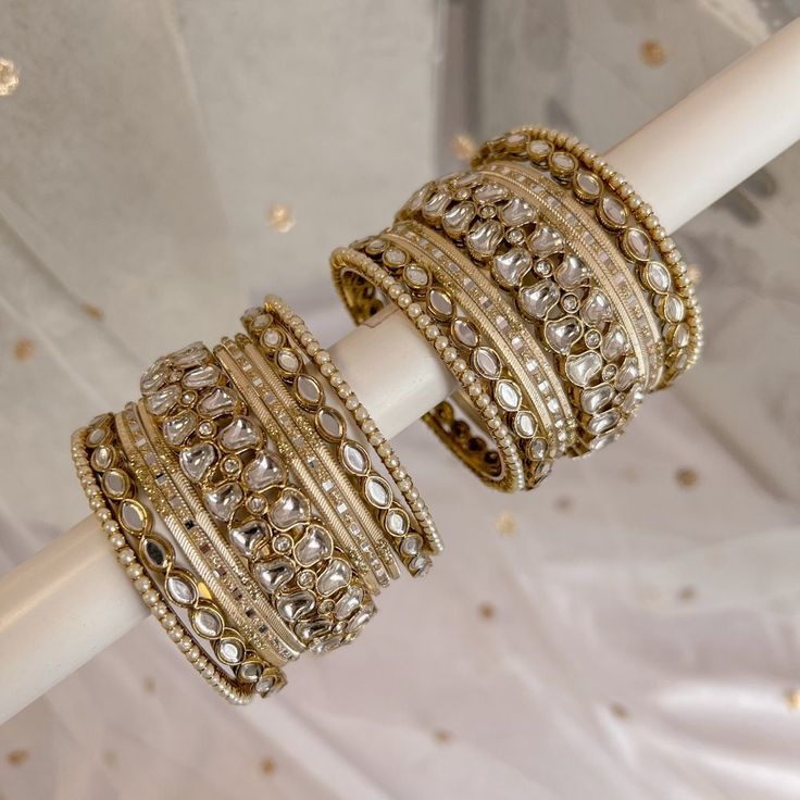 2 Midi sized luxury stacks with Mirror and cream bangles. Ready to Ship! Bangle Set Gold, Diy Quilling Crafts, Filigree Bangle, Bangle Stack, Bridal Jewellery Inspiration, Gold Bangle Set, Jewellery Indian, Mehndi Designs Book, Bangles Indian