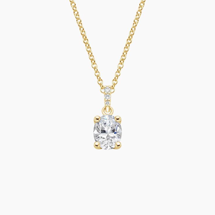 Pavé Diamond Bail Pendant - 18K Yellow Gold. A beautiful center gem is elegantly held in a four prong basket attached to a bail glittering with pavé set diamond accents. Elegant Baguette Cut Diamond Necklace In Prong Setting, Elegant Oval Pendant Diamond Necklace With Single Cut Diamonds, Exquisite Oval Diamond Necklace With Accents, Exquisite Gold Oval Diamond Necklace, Exquisite Oval Diamond Necklace, Classic Gold Diamond Necklace For Formal Occasions, Gold Oval Pendant Diamond Necklace For Formal Occasions, Formal Gold Diamond Necklace With Oval Pendant, Classic Yellow Gold Diamond Necklace For Formal Occasions