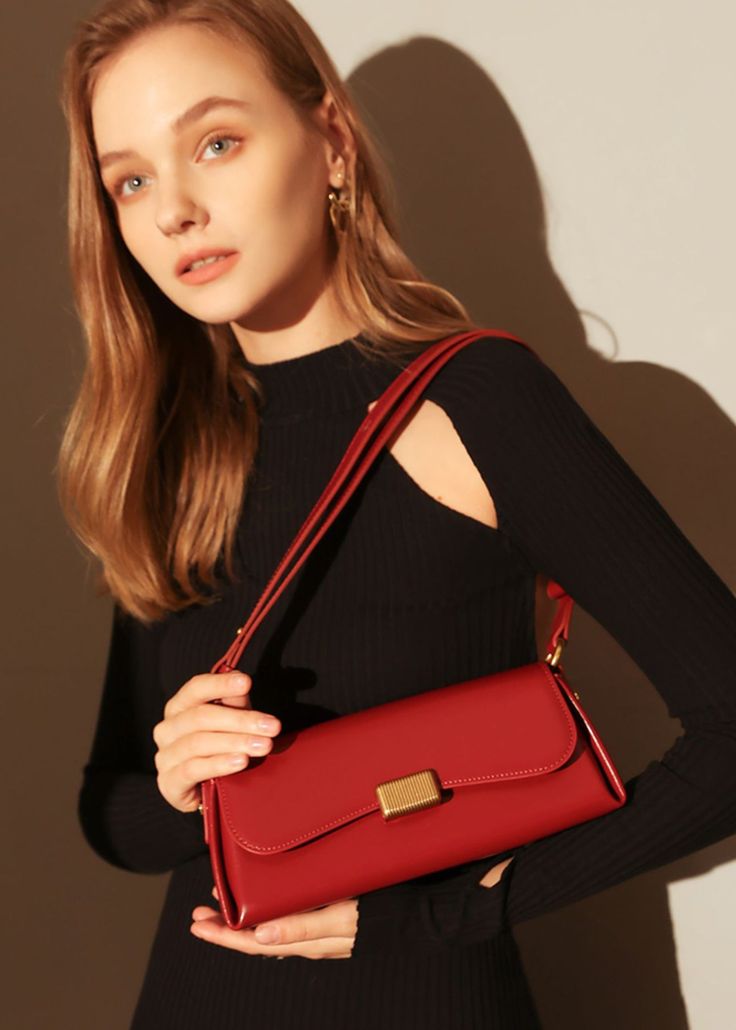 Indulge in sophistication and style with our Red Leather Baguette Shoulder Bag. The flap lock closure and adjustable strap combine practicality with elegance. The structured silhouette and flat base provide stability, while the interior slip pockets enhance organization. Handcrafted with genuine cowhide leather, this women's shoulder bag is the epitome of luxury. Size info 11" (28cm) width 4"(10cm) height 6 3/4"(17cm) depth Details Flap lock closure Adjustable shoulder strap Structured silhouett Classic Clutch Baguette Bag With Adjustable Strap, Classic Baguette Bag With Hasp Closure, Classic Business Baguette Shoulder Bag, Classic Formal Baguette Bag With Adjustable Strap, Versatile Formal Baguette Bag With Adjustable Strap, Formal Baguette Shoulder Bag With Adjustable Strap, Classic Baguette Bag With Adjustable Strap, Elegant Leather Baguette Bag With Magnetic Closure, Elegant Leather Clutch Baguette Bag