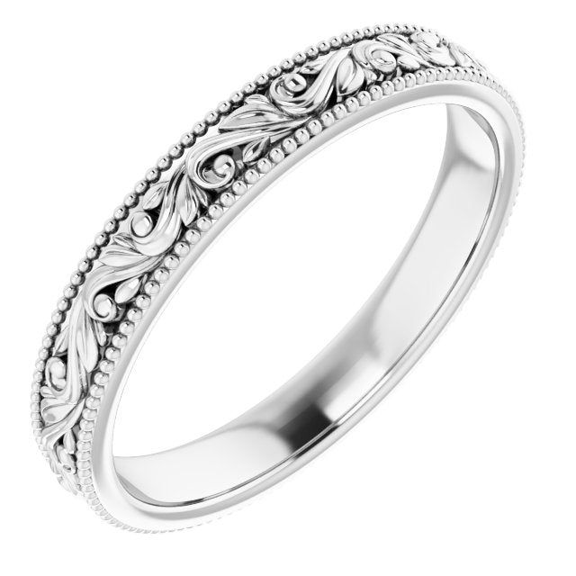 a wedding band with intricate designs on it