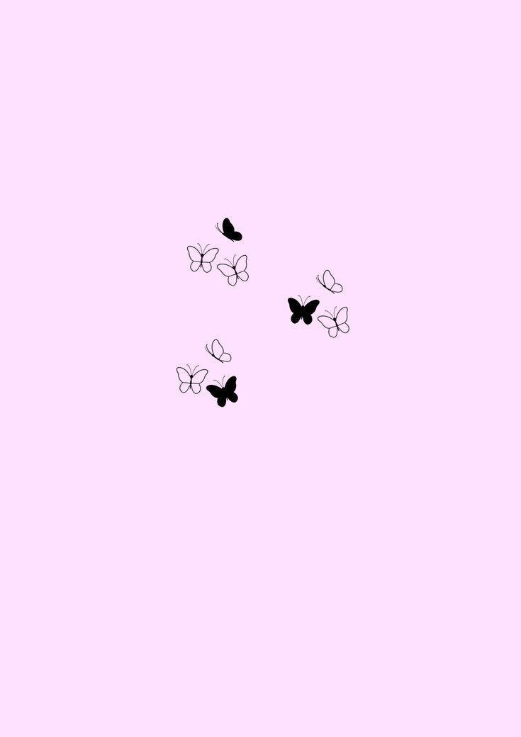 four butterflies flying in the air on a pink background