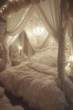 a white bed sitting in a bedroom next to a chandelier with lights on it