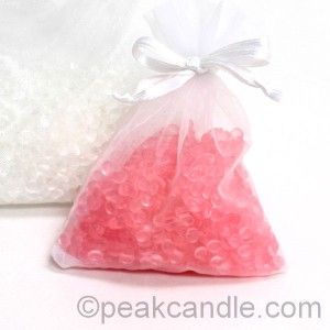 a bag filled with pink and white candies