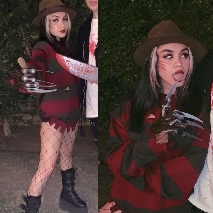 two women dressed up as zombies and one is holding a knife with blood on it