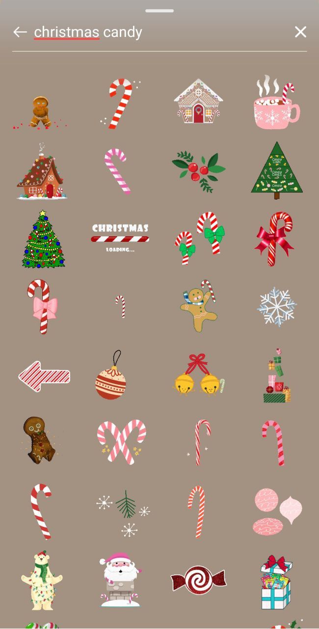 an image of christmas candy stickers on a cell phone screen, with the text merry and