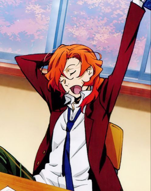 an orange haired woman sitting at a desk in front of a window with her arms up