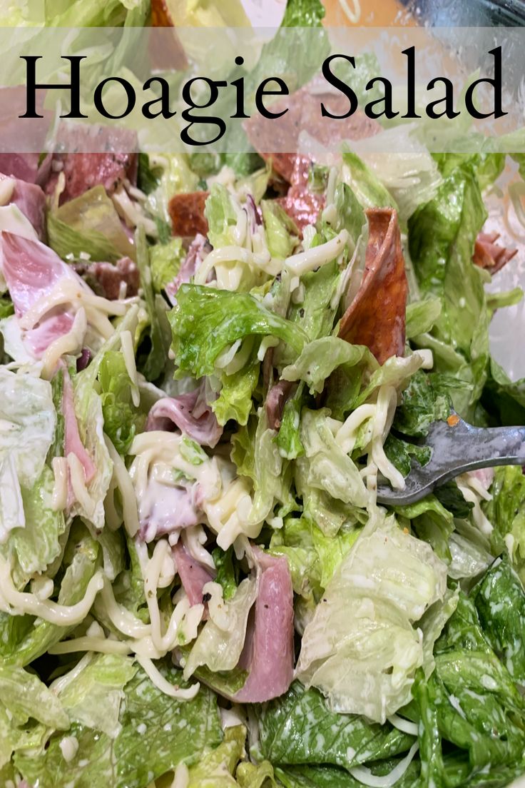 a salad with lettuce, meat and dressing on it is shown in front of the words hoagie salad