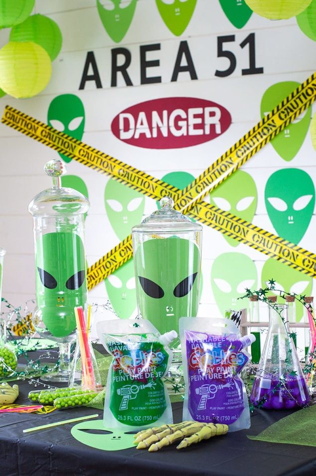 an alien themed birthday party with candy and candies